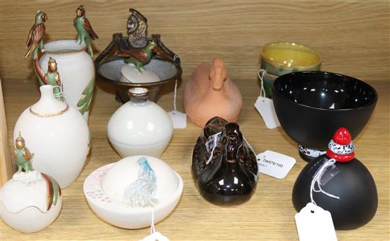 A collection of small studio glass and pottery items,